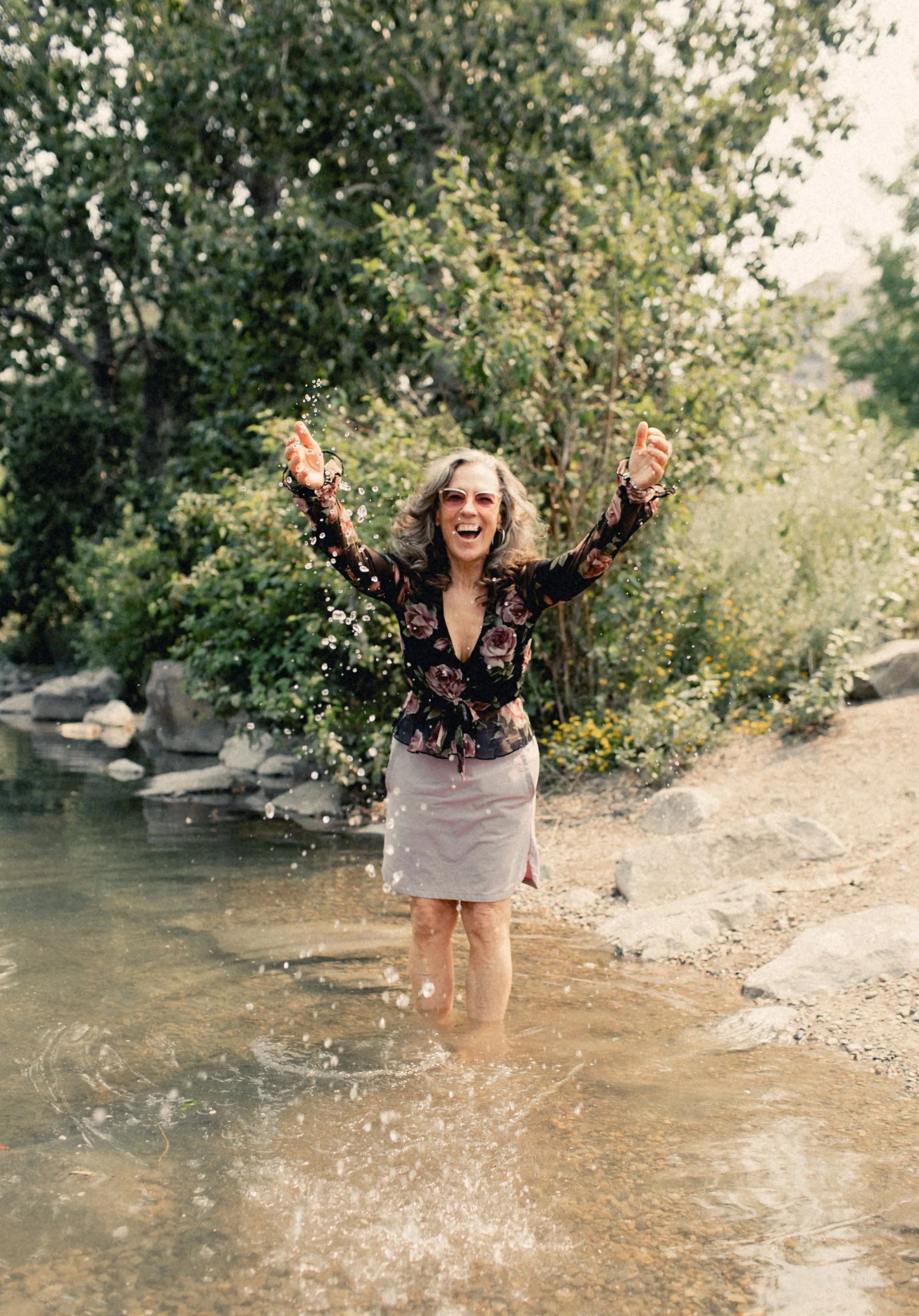 Heidi laughing outdoors